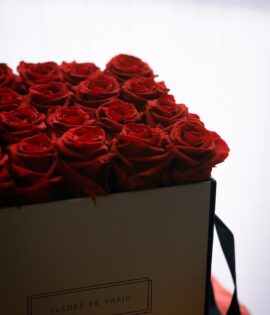 red rose bouquet on brown cardboard box